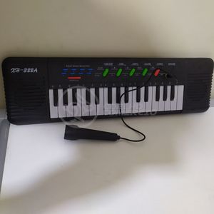 Mini Teclado Infantil32 TeclasKaraokê E Microfone A Pilha