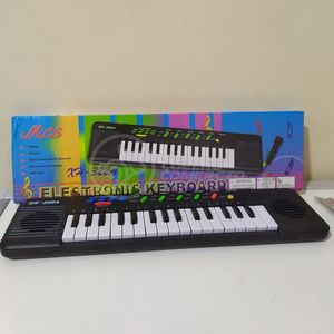 Mini Teclado Infantil32 TeclasKaraokê E Microfone A Pilha