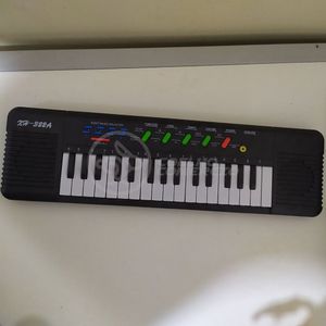 Mini Teclado Infantil32 TeclasKaraokê E Microfone A Pilha